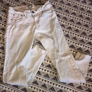 White distressed skinny jeans.